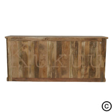 Charger l&#39;image dans la galerie, Buffet industriel, fait en bois massif de manguier et métal. Cette enfilade est composée de 6 tiroirs en bois, 2 portes coulissantes et de 2 étagères . Le mélange bois brut et métal apportera une touche unique et pleine de charme à votre intérieur. Mesures: 200 x 45 x 90 cm. Kukuu, boutique en ligne de meubles et décoration d&#39;intérieur. 
