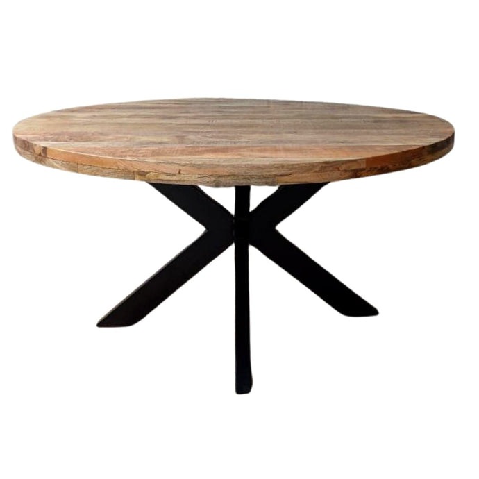 La table à manger ronde industrielle a été fabriquée à partir d'une base en métal et d'un bois en bois massif de manguier. Mesures: 150 x 150 x 76 cm. Kukuu, boutique en ligne de mobilier industriel.