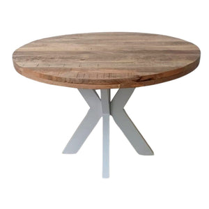 La table ronde blanche a été fabriquée à partir d'acier et de bois massif de manguier. Mesures: 120 x 120 x 78 cm. Kukuu, boutique en ligne de mobilier industriel.