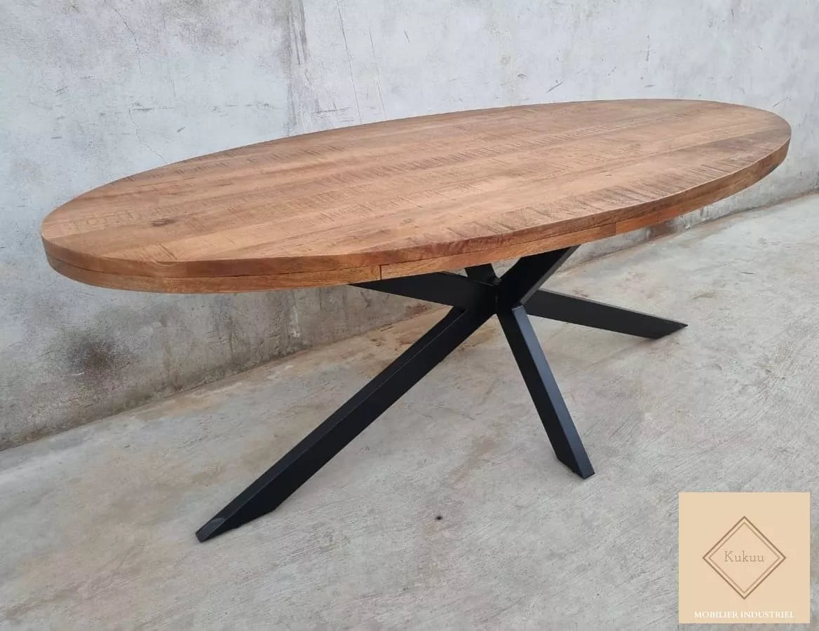 La table à manger ovale industrielle SYDNEY est disponible en 180, 200, 210, 220 et 240 cm. Celle-ci a été faite en bois massif de manguier et métal. Mesures: 240 x 100 x 78 cm. Livraison offerte en France métropolitaine et Belgique. Kukuu, boutique en ligne de mobilier style industriel.